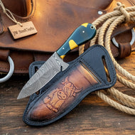 Damascus Basilisk Skinner Knife – Hand-Forged Drop Point Blade with Green & Yellow Composite Handle